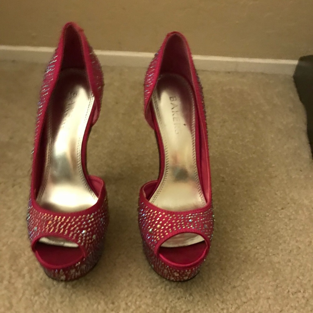Hot pink studded peep toe heels.